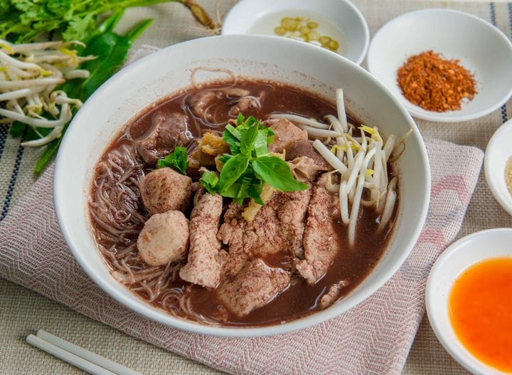 Boat noodles — small bowls of dark, rich pork noodle soup
