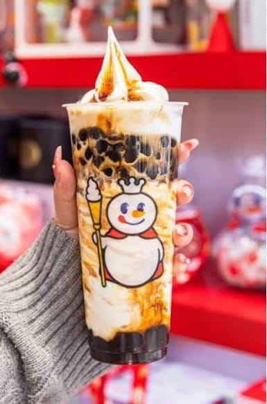 Bubble tea with tapioca pearls and a wide straw