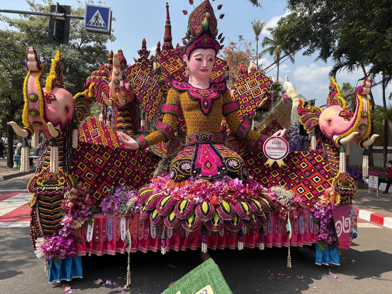 Elaborate flower-decorated parade float at the Chiang Mai Flower Festival
