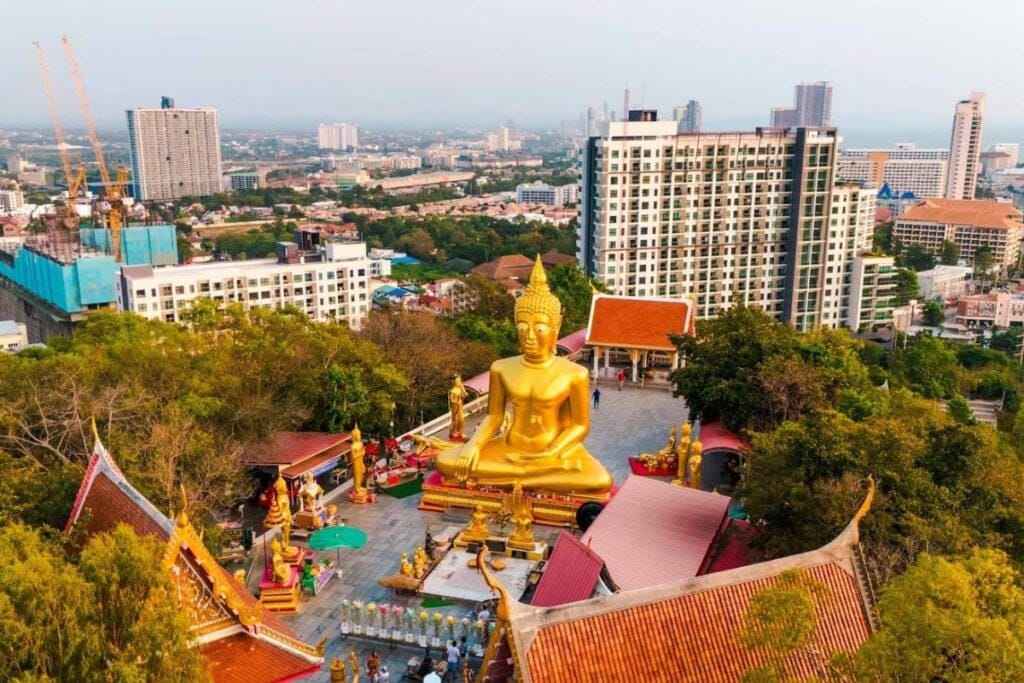 Golden Big Buddha statue overlooking Pattaya city