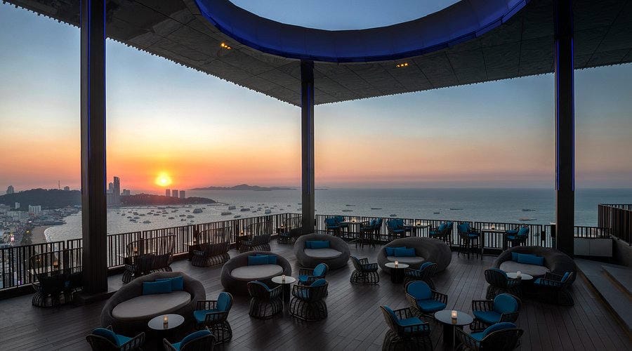 Horizon rooftop bar at Hilton Pattaya with sunset view over the bay