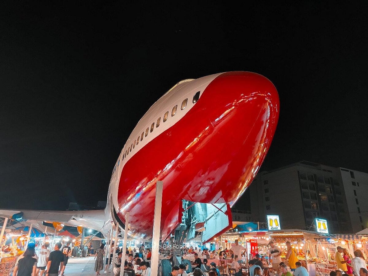 Runway Market Pattaya with Boeing 747 airplane at night