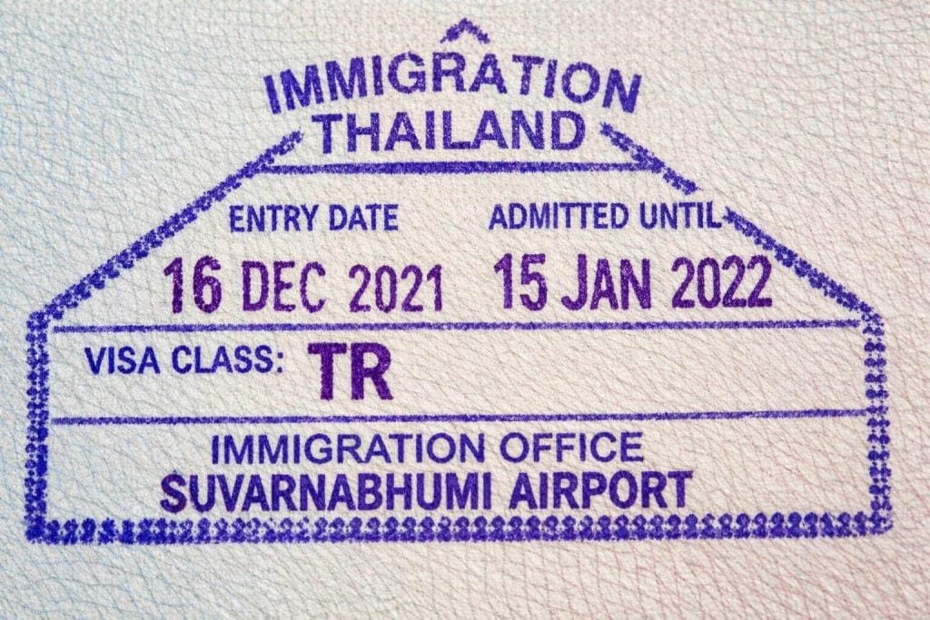 Close-up of a Thai immigration entry stamp in a passport